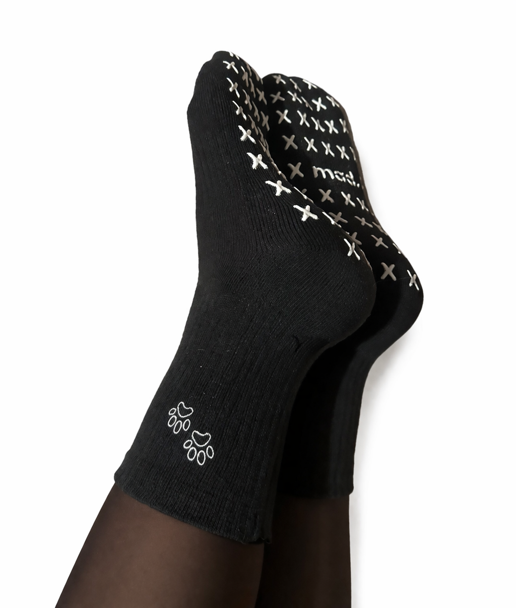 The black on white grip socks (60% goes to the Animal foundation program)