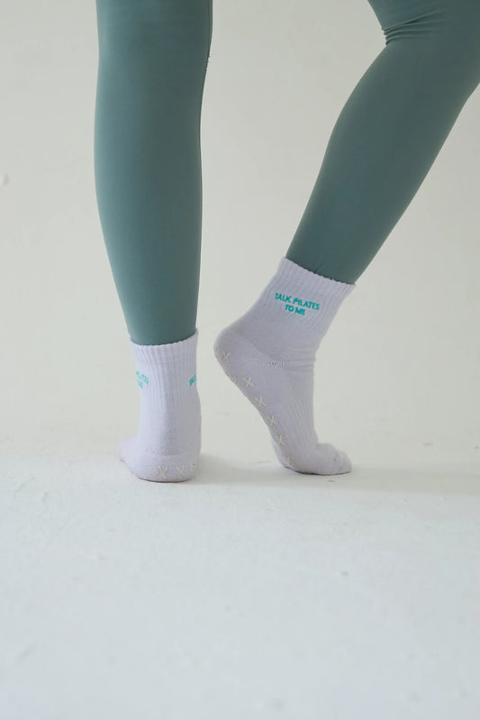 "Talk pilates to me" mad grip socks