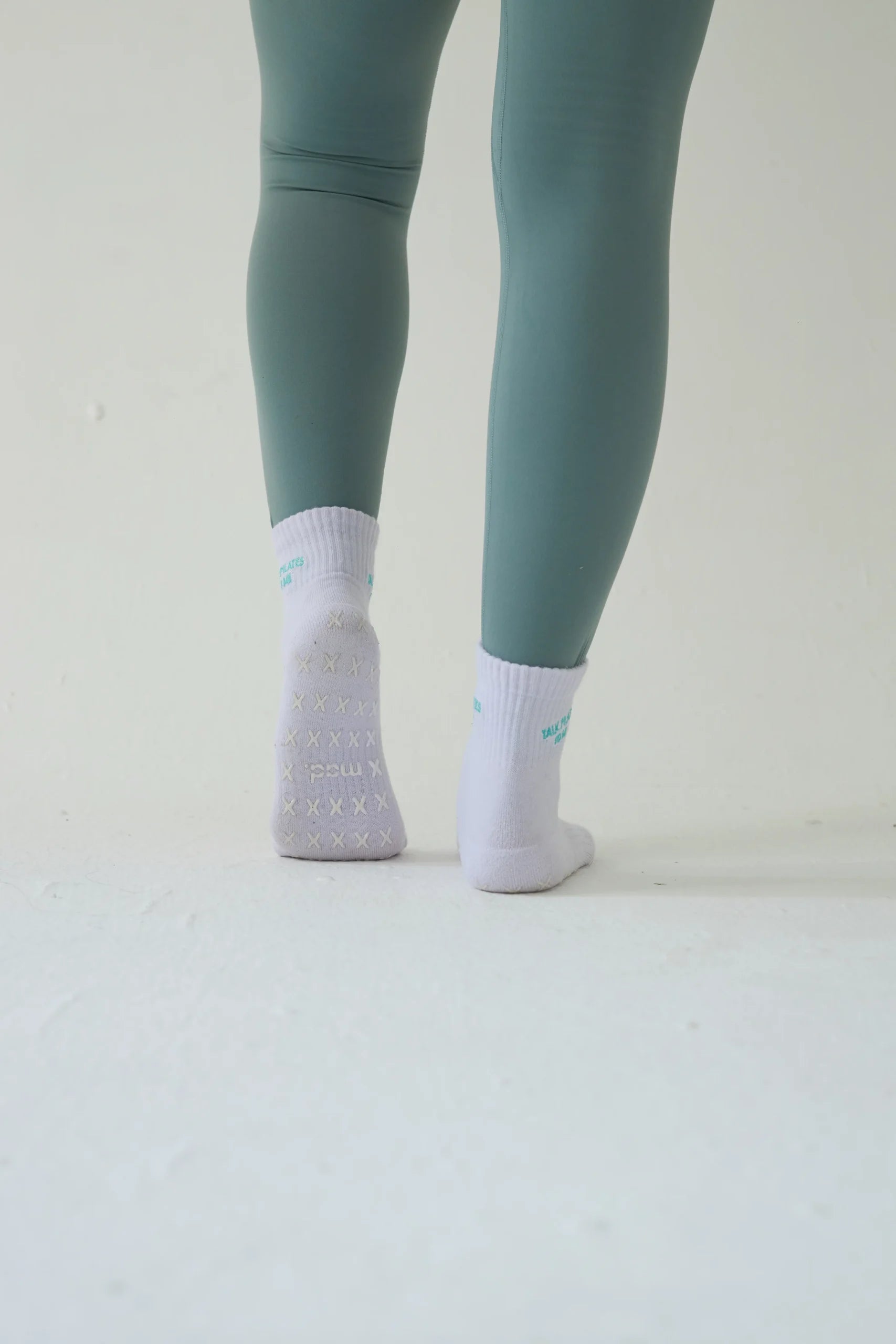 "Talk pilates to me" mad grip socks