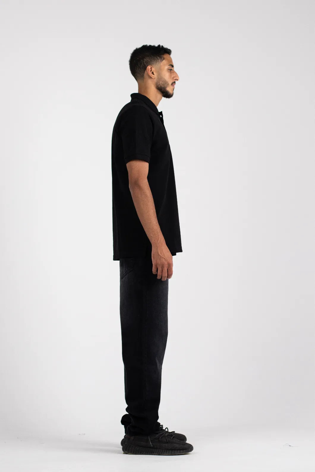 The Opalith Crest Black Polo
