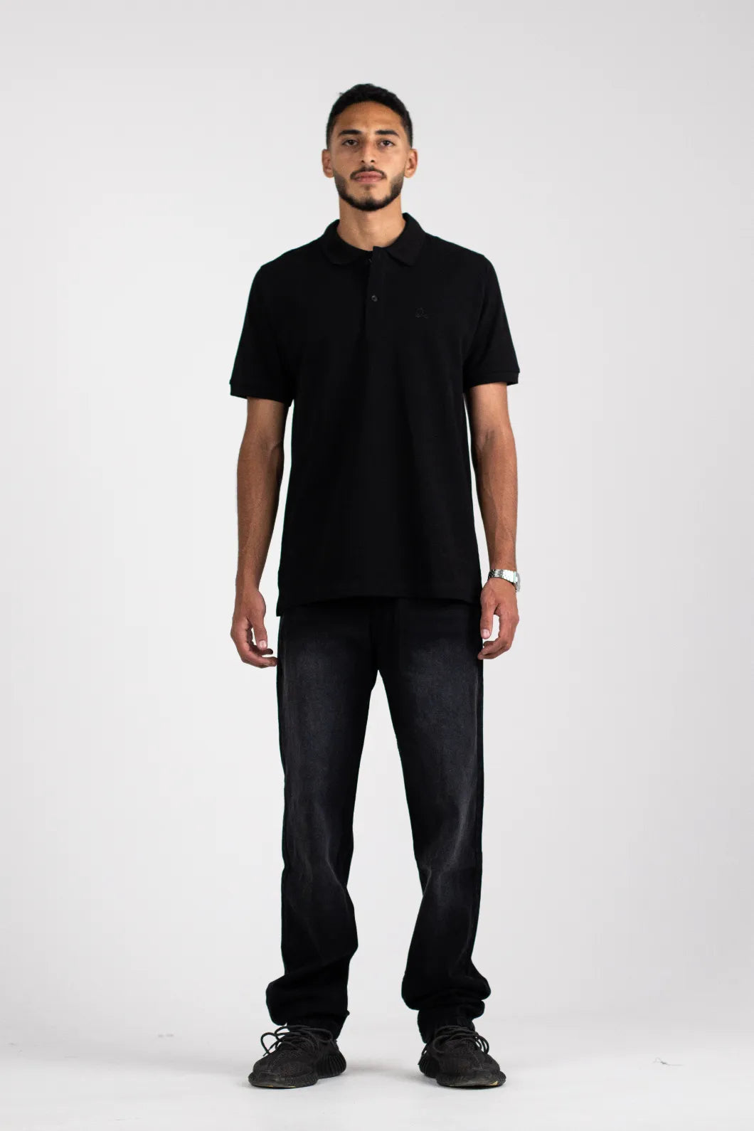 The Opalith Crest Black Polo