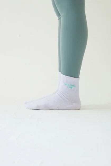 "Talk pilates to me" mad grip socks